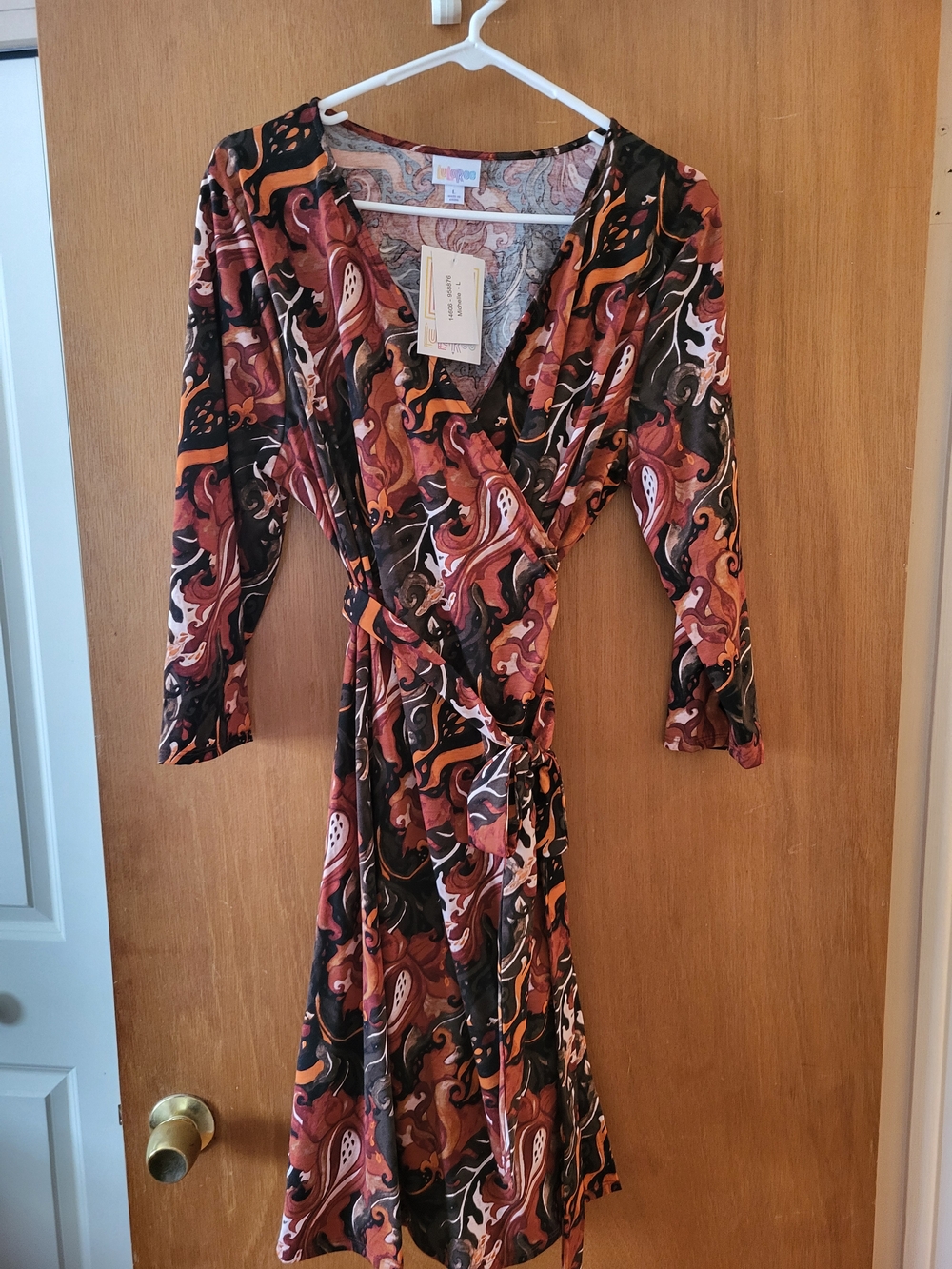 LuLaRoe Michelle  Long Sleeve Wrap Dress in Rust, Black & Orange Swirl Print